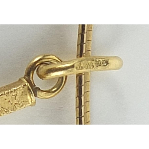 728 - Large 9ct gold Modernist cross pendant on a 9ct gold necklace, 7.5cm high and 38cm in length, total ... 