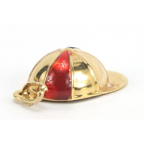 489 - 9ct gold and enamel jockey cap charm, 2cm high, 1.2g