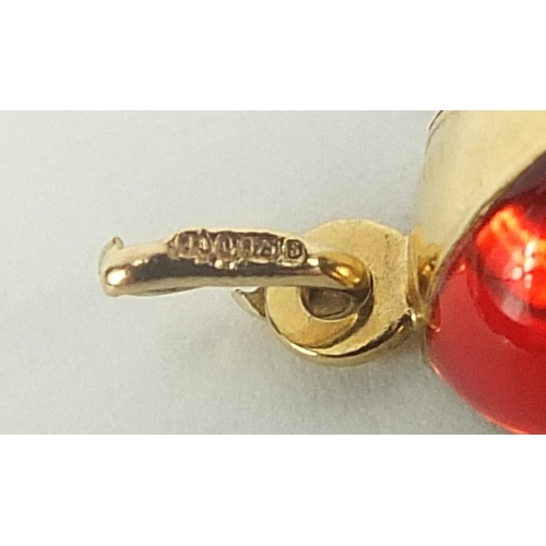 489 - 9ct gold and enamel jockey cap charm, 2cm high, 1.2g