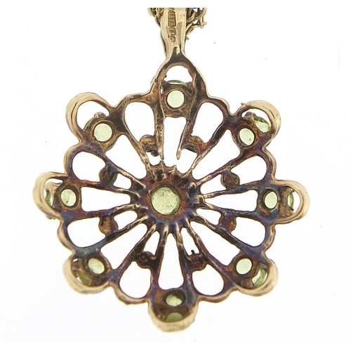 245 - 9ct gold peridot pendant on a 9ct gold necklace, 2.5cm high and 40cm in length, total 3.8g