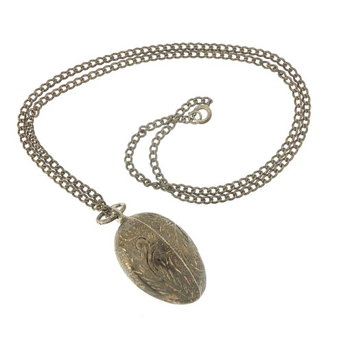 1856 - Silver engraved egg pendant on a sterling silver necklace, 4cm high and 56cm in length, total 19.0g