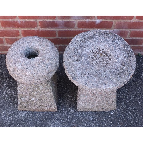 2596 - Two stoneware garden stands/tables, possibly granite, the largest 41cm high