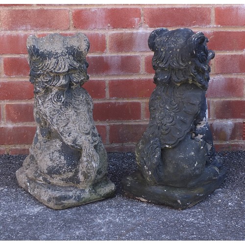 2591 - Pair of stoneware garden dogs of Foo, 46cm high