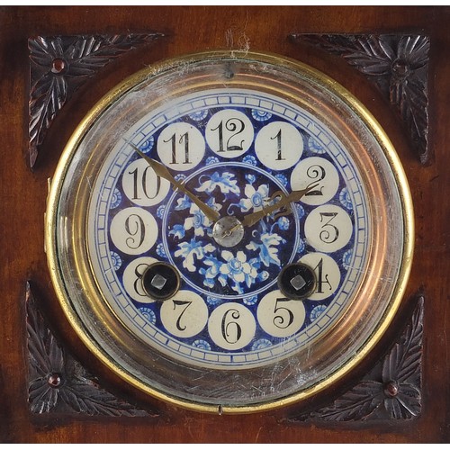 686 - 19th century walnut mantle clock with foliate dial having Arabic numerals, the movement numbered 181... 