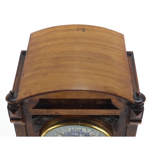 686 - 19th century walnut mantle clock with foliate dial having Arabic numerals, the movement numbered 181... 