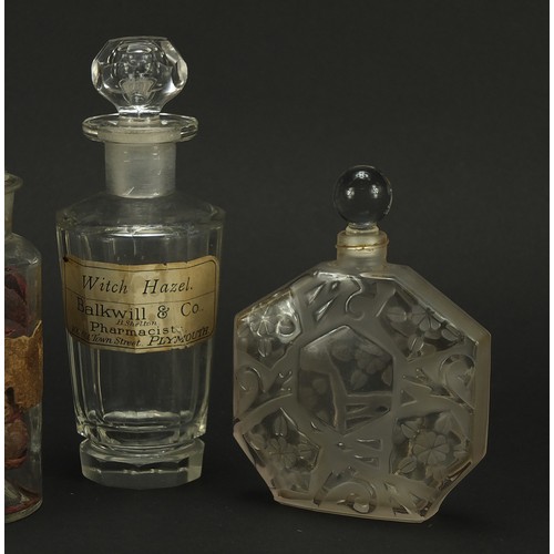 668 - Four 19th century apothecary glass jars and an Art Deco frosted and clear glass scent bottle, one wi... 