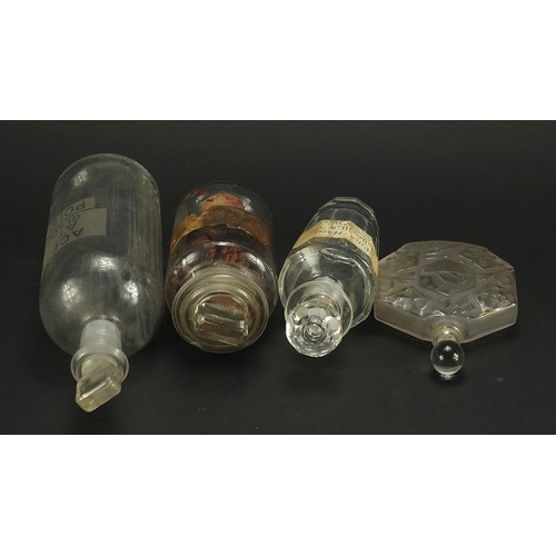 668 - Four 19th century apothecary glass jars and an Art Deco frosted and clear glass scent bottle, one wi... 