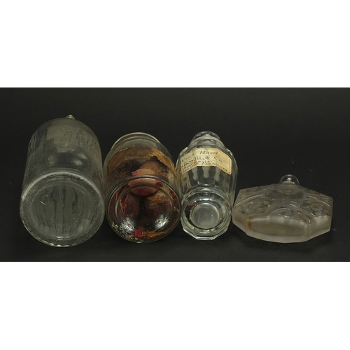 668 - Four 19th century apothecary glass jars and an Art Deco frosted and clear glass scent bottle, one wi... 