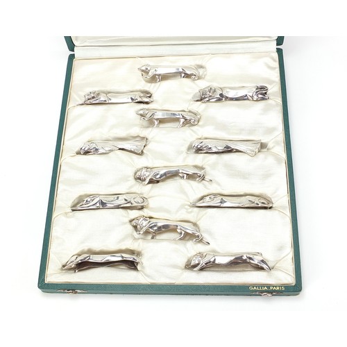 299 - Gallia, set of twelve French Art Deco silver plated knife rests in the form of animals, housed in a ... 