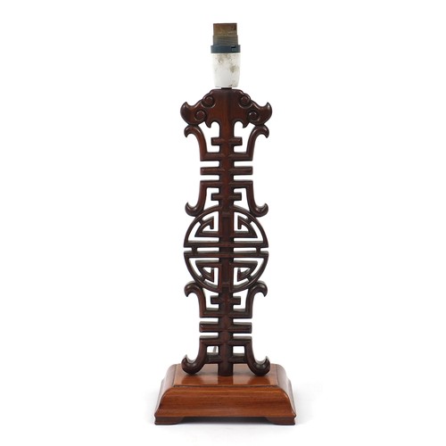 2096 - Chinese carved hardwood table lamp, 37cm high excluding the fitting