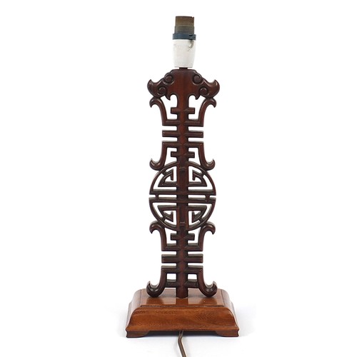 2096 - Chinese carved hardwood table lamp, 37cm high excluding the fitting