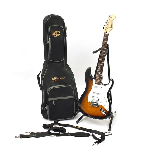 1760 - Squier Stratocaster by Fender bullet strapped six string electric guitar with case, 97.5cm in length