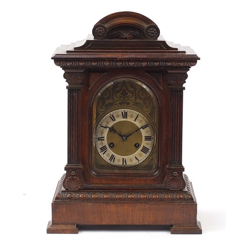 76 - Junghans, German walnut cased chiming bracket clock with brass face and silvered chapter ring having... 