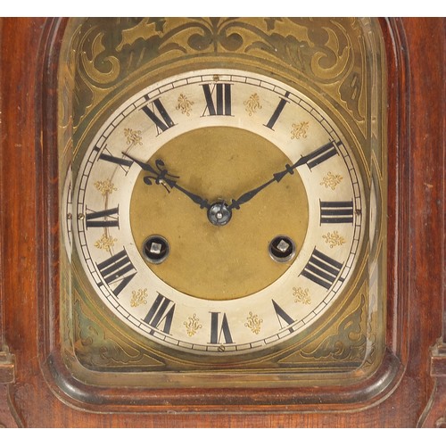 76 - Junghans, German walnut cased chiming bracket clock with brass face and silvered chapter ring having... 