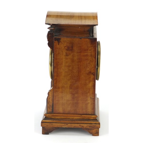 686 - 19th century walnut mantle clock with foliate dial having Arabic numerals, the movement numbered 181... 