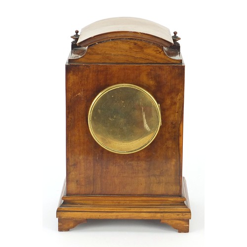 686 - 19th century walnut mantle clock with foliate dial having Arabic numerals, the movement numbered 181... 