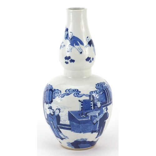 449 - Chinese blue and white porcelain double gourd vase hand painted with figures in a palace setting, si... 