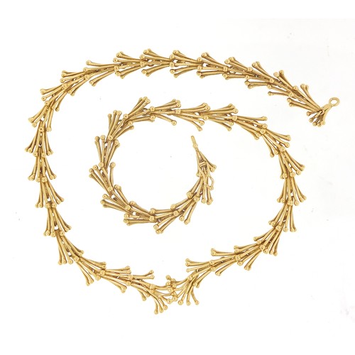 45 - John Donald, Modernist 18ct gold necklace housed in a John Donald velvet and silk lined box, 38cm in... 