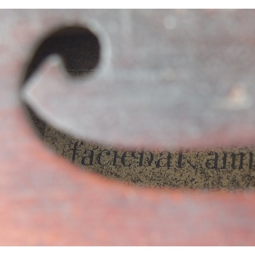 843 - Old wooden violin bearing an Antonius Stradivarius paper label, the violin back 11.75 inches in leng... 