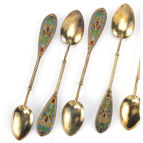 669 - Johan G Kjaerland, set of eight Norwegian silver gilt and plique à jour enamel teaspoons housed in a... 