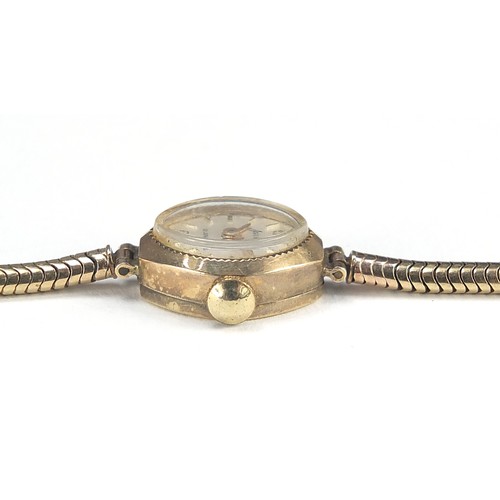 1818 - Accurist, ladies 9ct gold wristwatch with 9ct gold strap, the case 15mm wide, 14.0g