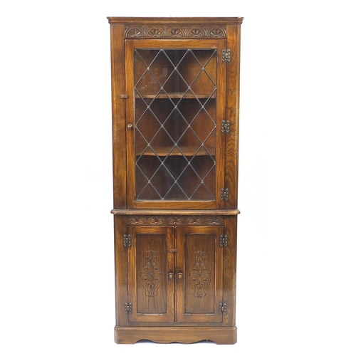 1023 - Oak corner cupboard with leaded glass door, 183cm H x 69cm W x 48cm D