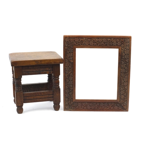 1610 - Carved oak stool and photo frame, the stool 25cm high