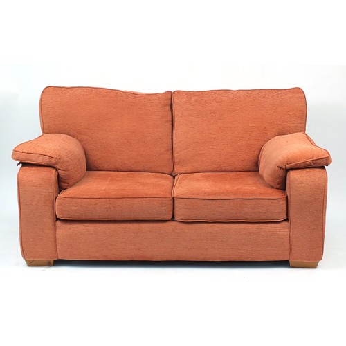 1028A - Som’Toile two seater sofa bed with salmon upholstery, 170cm wide
