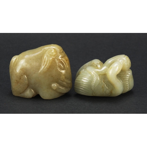 717 - Two Chinese celadon jade carvings including one of two ducks, the largest 4.5cm in length