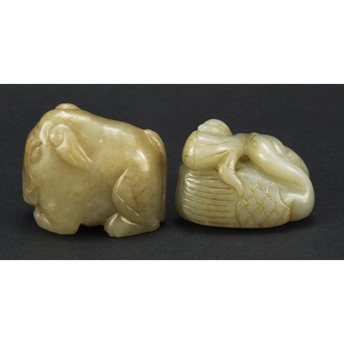 717 - Two Chinese celadon jade carvings including one of two ducks, the largest 4.5cm in length