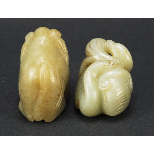 717 - Two Chinese celadon jade carvings including one of two ducks, the largest 4.5cm in length