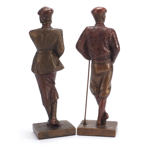 2427 - Hand painted plaster figures of golfers, the largest 42cm high