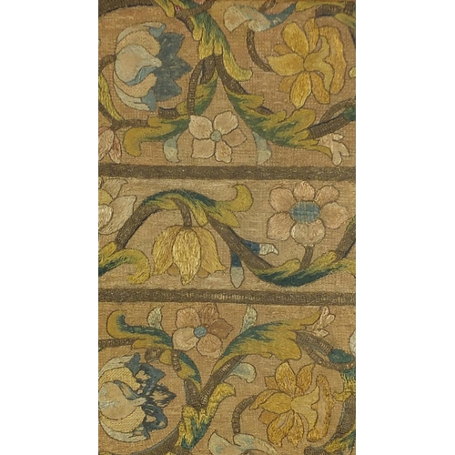910 - Arts & Crafts textile embroidered with flowers, mounted, framed and glazed, 55cm x 32cm excluding th... 