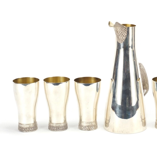 525 - House of Lawrian for Christopher N Lawrence, contemporary silver seven piece drinking set comprising... 