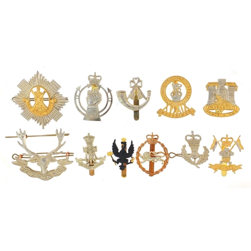 3470 - Eleven British military Staybright cap badges including The Royal Scots and The Green Howards