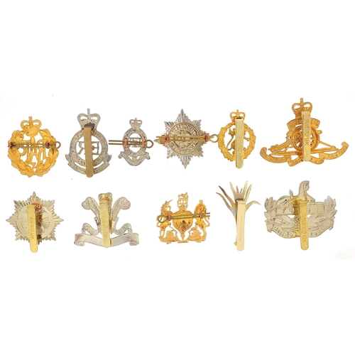 3467 - Eleven British military Staybright cap badges including RAF and Gurkha Transport Regiment