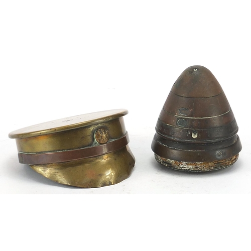 3504 - British military trench art including a peaked cap, 9cm in diameter