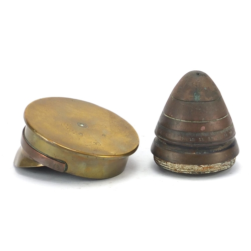 3504 - British military trench art including a peaked cap, 9cm in diameter