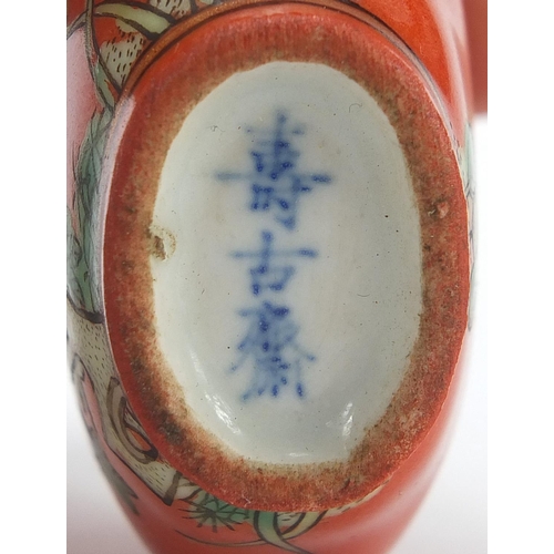 2423 - Four Chinese snuff bottles including a cameo glass example, the largest 7.5cm high