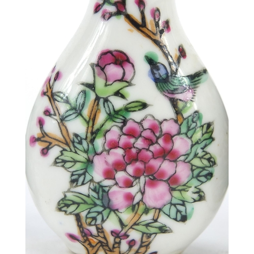 2423 - Four Chinese snuff bottles including a cameo glass example, the largest 7.5cm high