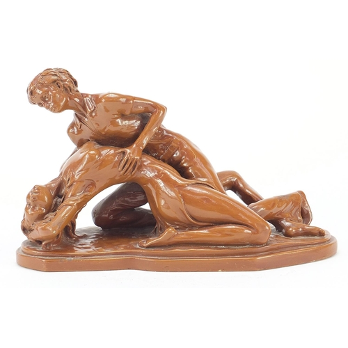 2424 - Resin sculpture of two lovers, 32cm wide