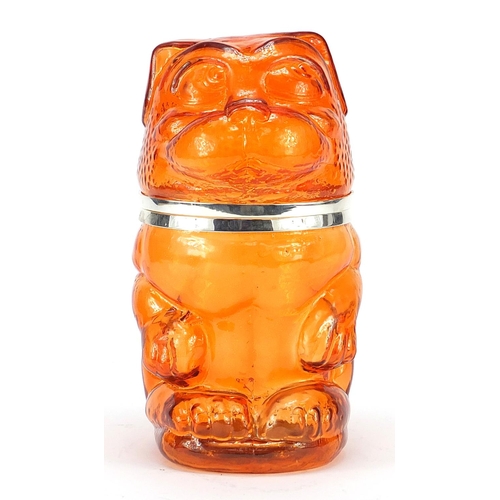 2430 - Novelty amber glass biscuit barrel with hinged lid in the form of a standing dog, 25cm high