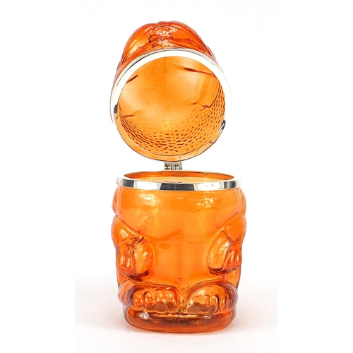 2430 - Novelty amber glass biscuit barrel with hinged lid in the form of a standing dog, 25cm high