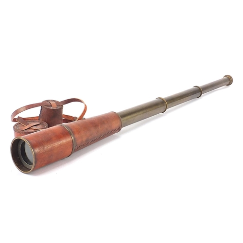 2433 - Military interest three draw brass telescope with leather case, 29.5cm in length when closed