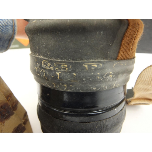 3522 - Militaria including ammunition tins, trench art shell case engraved with a dragon and gas mask