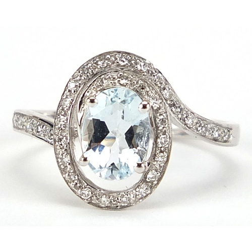 462 - 9ct white gold aquamarine and diamond ring, size N, 2.5g