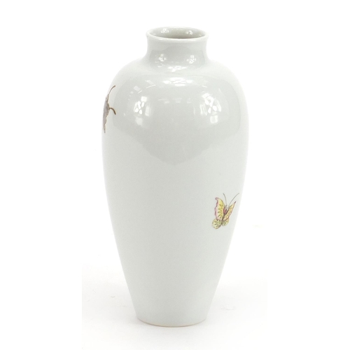 586 - Chinese porcelain vase finely hand painted in the famille rose palette with butterflies amongst flow... 