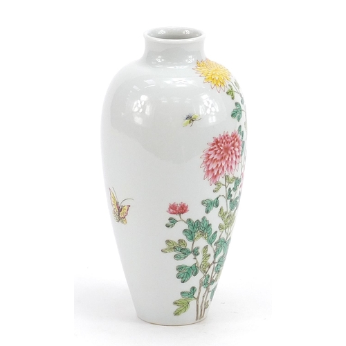 586 - Chinese porcelain vase finely hand painted in the famille rose palette with butterflies amongst flow... 