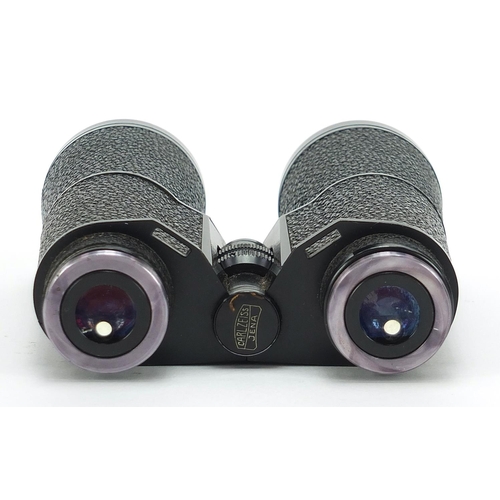 3491 - Pair of Carl Zeiss Jenner DDR binoculars numbered 5857235, 14cm in length