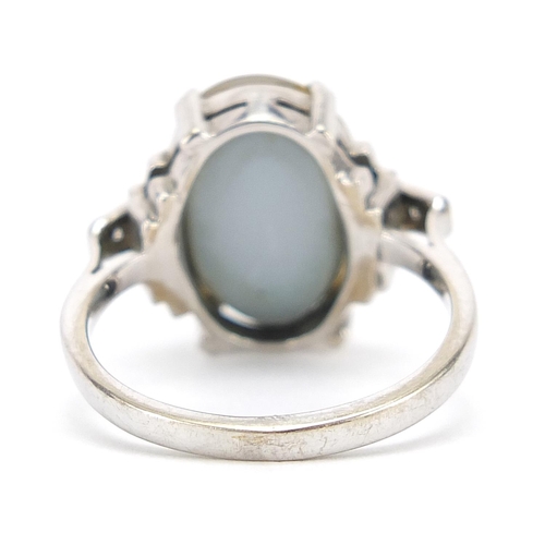 101 - Unmarked white gold cabochon opal ring with diamond shoulders, size M/N, 4.2g